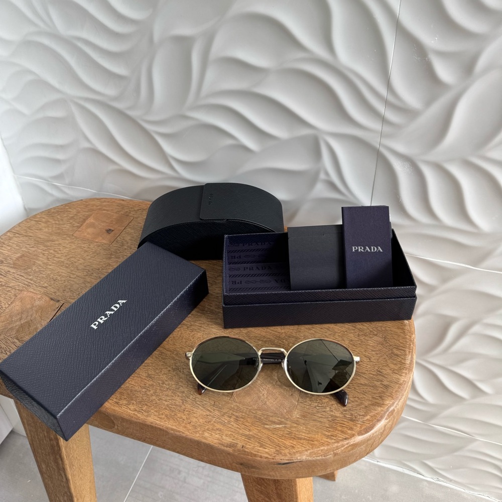 New Unused Prada Black and Gold Sunglasses with Case